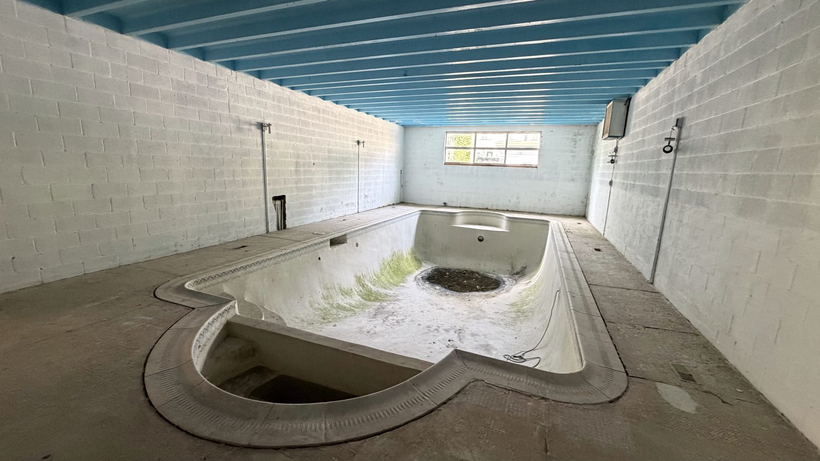 Existing indoor pool shell before reconstruction